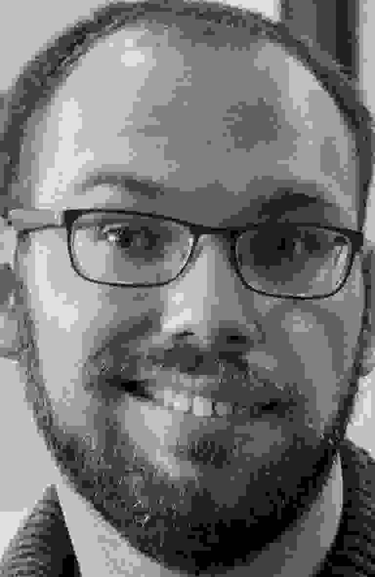 Headshot of freelance editor Jonathan Marks