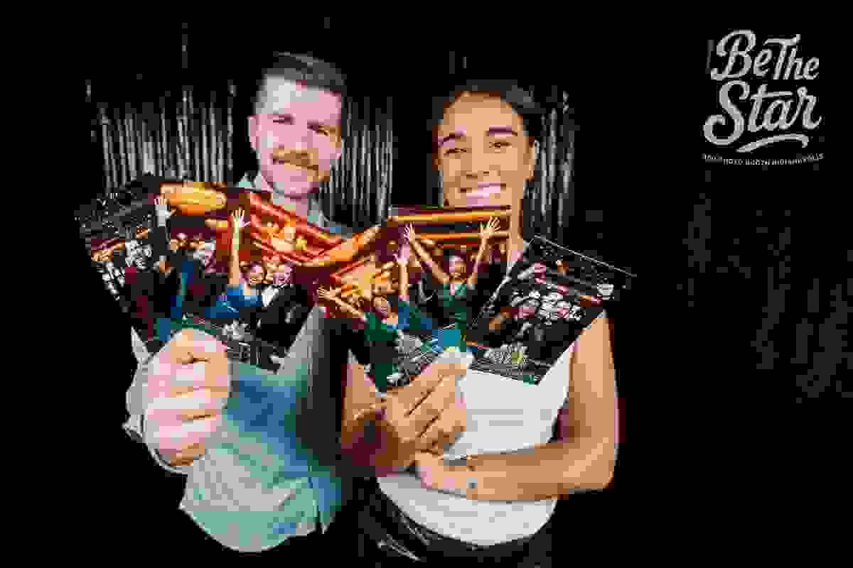 Couple showing pictures of our casino photo booth Couple showing pictures of our casino photo booth