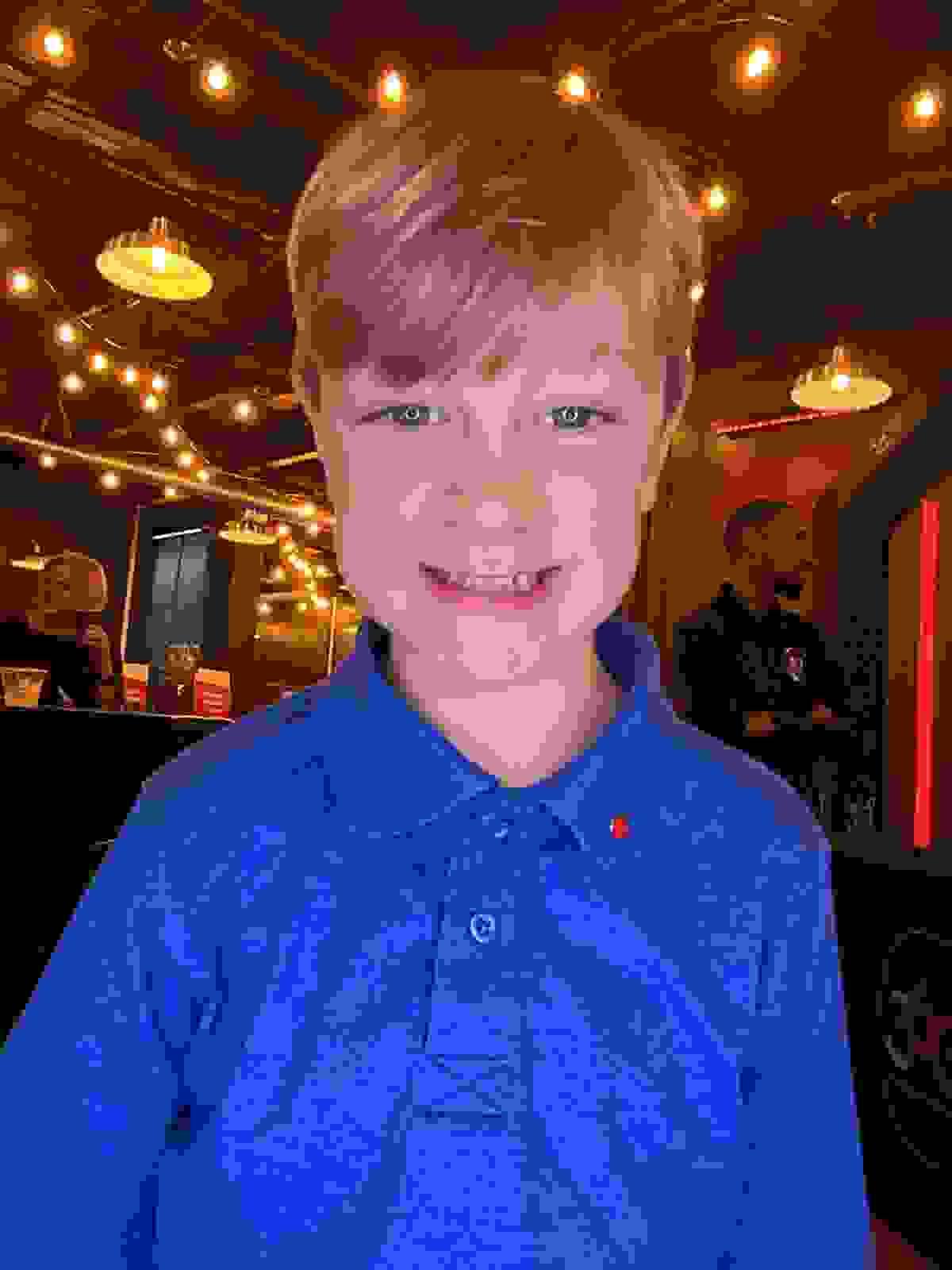 Young man at the Bidwell during a non-profit event using the Roamer booth in Indianapolis at the Bidwell Young man at the Bidwell during a non-profit event using the Roamer booth in Indianapolis at the Bidwell