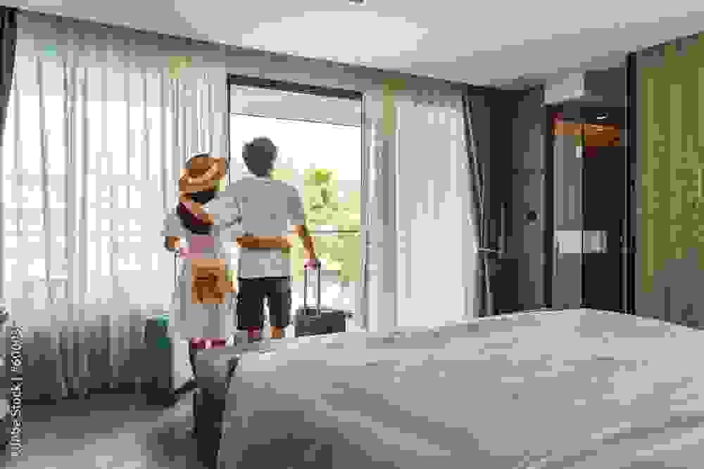 woman checking in to hotel