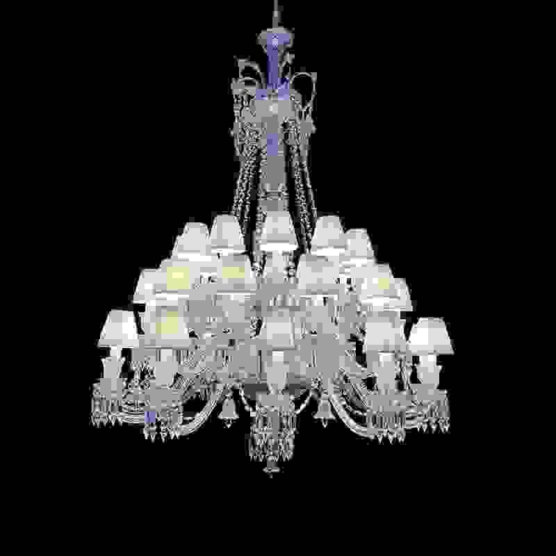 Baccarat style crystal chandelier adding elegance to luxury hotel lobbies