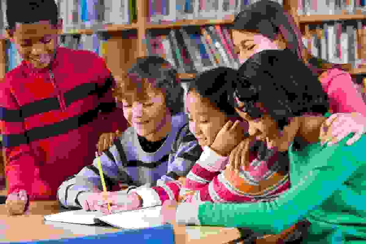 Kids studying together.