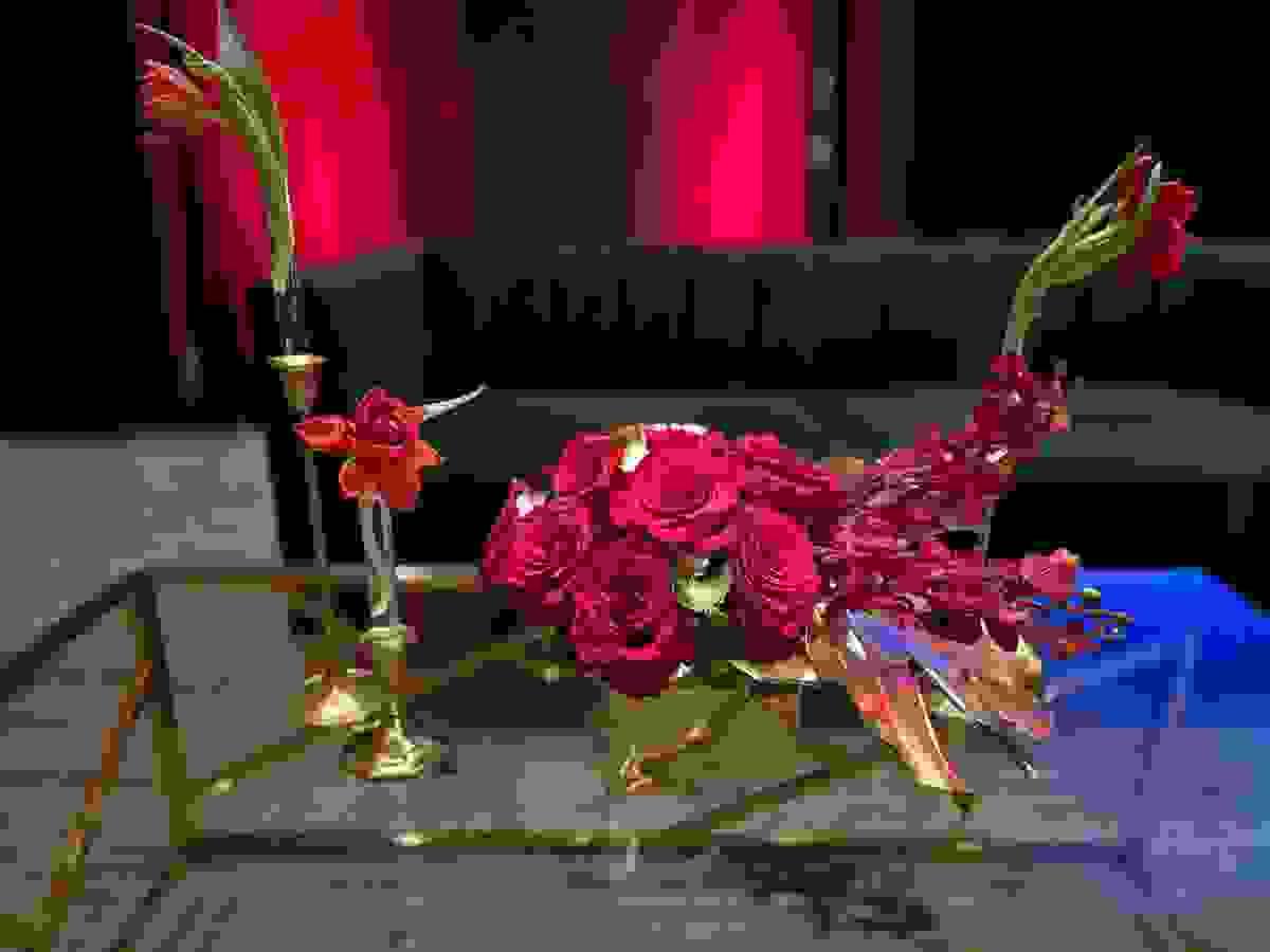 Modern red rose floral design for couch lounge area