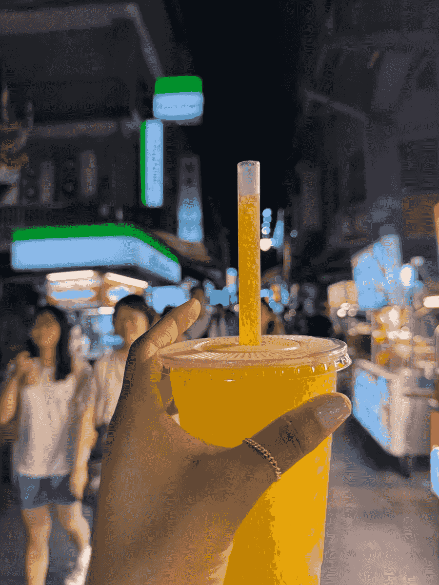 A yummy and refreshing Mango flavored slushie smoothie in a night market street