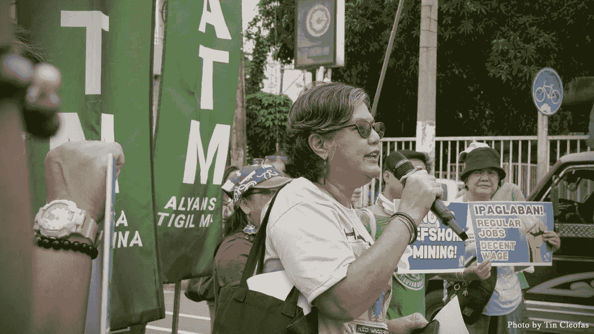Judy Pasimio, Overall Cordinator of LILAK Purple Action for Indigenous Women's Rights giving her solidarity message during SONA action.