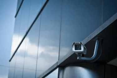 AI-HDCVI- IP-Wi-Fi camera mounted on building CCTV installation and surveillance 