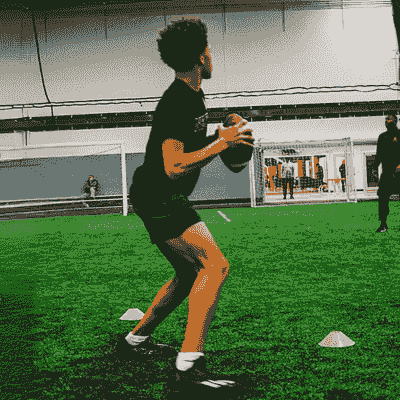 Quarterback dropping back after a snap