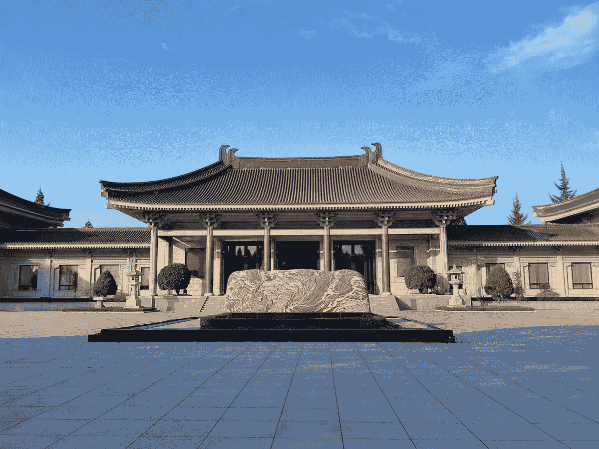 Tang-style exterior of the Shaanxi History Museum beneath a clear blue sky in Xi’an Tang-style exterior of the Shaanxi History Museum beneath a clear blue sky in Xi’an