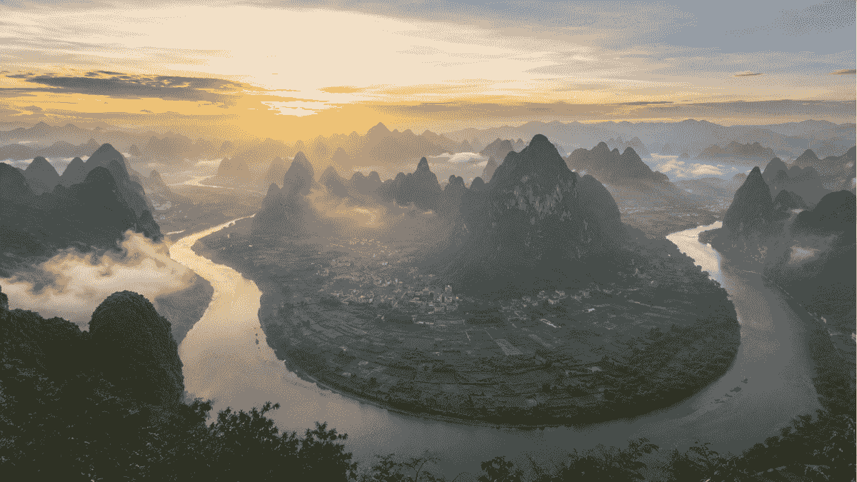 Sunrise over the Li River and karst peaks from Xianggong Mountain near Yangshuo Sunrise over the Li River and karst peaks from Xianggong Mountain near Yangshuo
