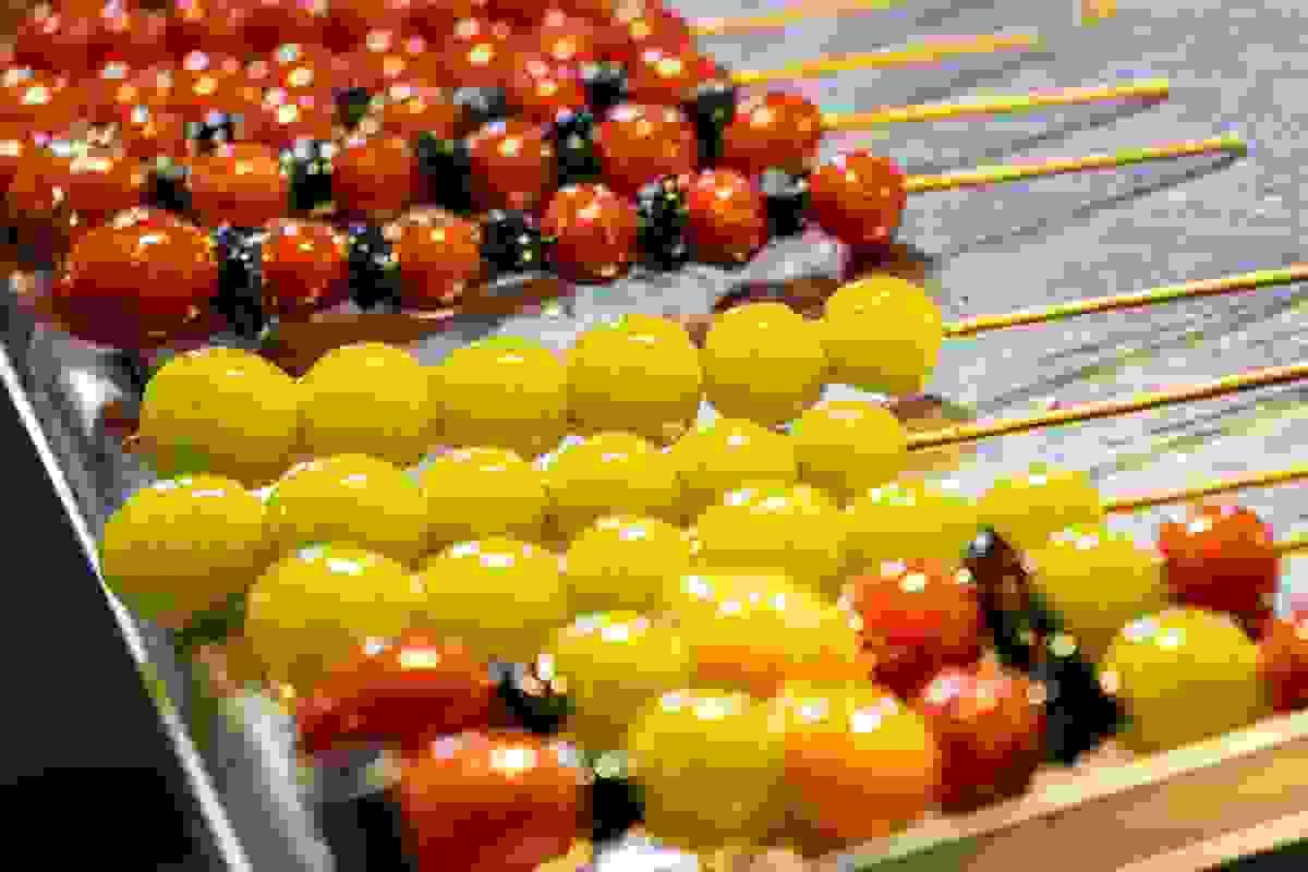 Colorful candied fruit skewers on a stick โ traditional Beijing street snack Tanghulu Colorful candied fruit skewers on a stick โ traditional Beijing street snack Tanghulu