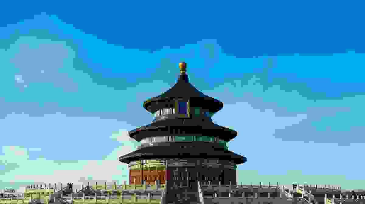 The Temple of Heaven's iconic blue-roofed Hall of Prayer for Good Harvests standing tall against a clear blue sky in Beijing The Temple of Heaven's iconic blue-roofed Hall of Prayer for Good Harvests standing tall against a clear blue sky in Beijing