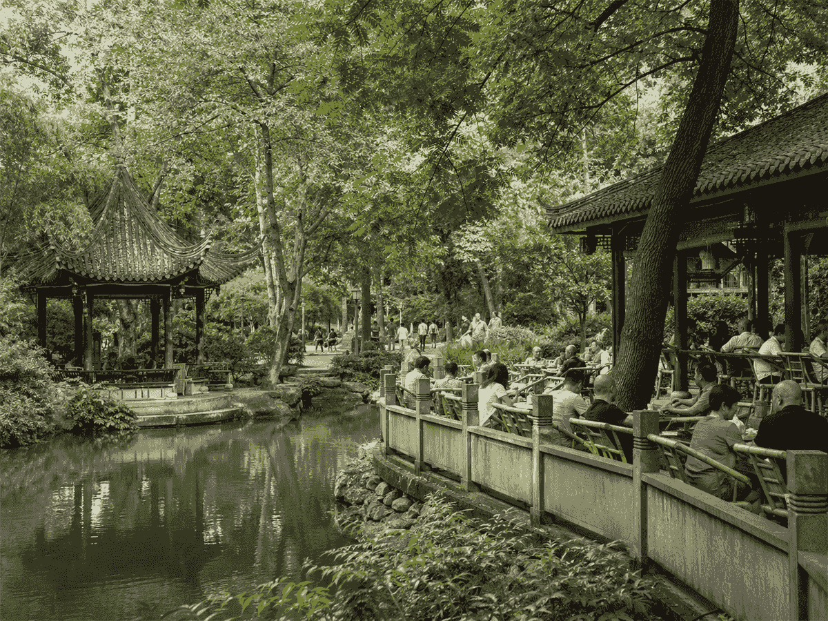 Local residents relaxing at an open-air teahouse in Chengdu People’s Park. Local residents relaxing at an open-air teahouse in Chengdu People’s Park.