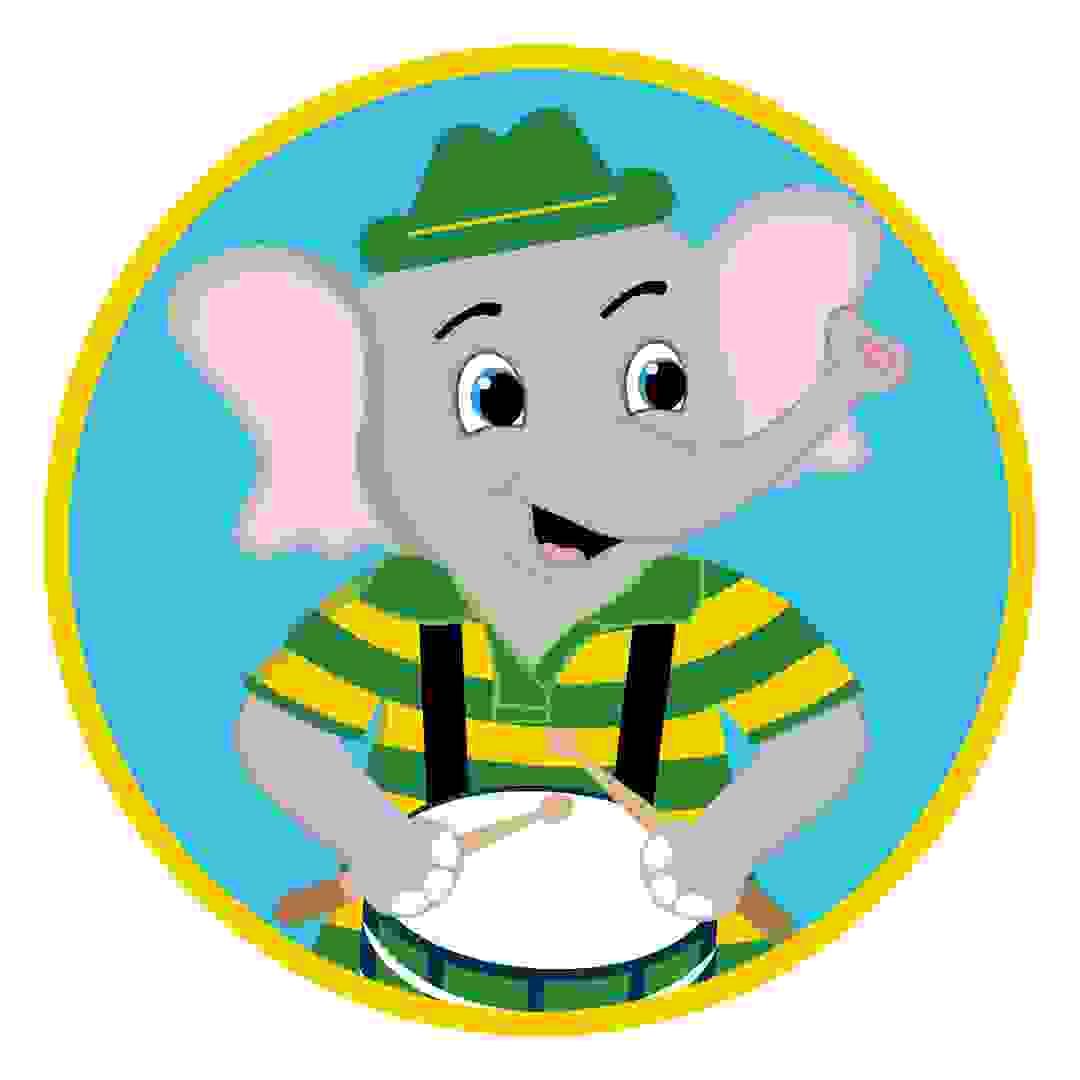 Ivan Elephant smiles while playing his drum in Harmony Ridge Ivan Elephant smiles while playing his drum in Harmony Ridge