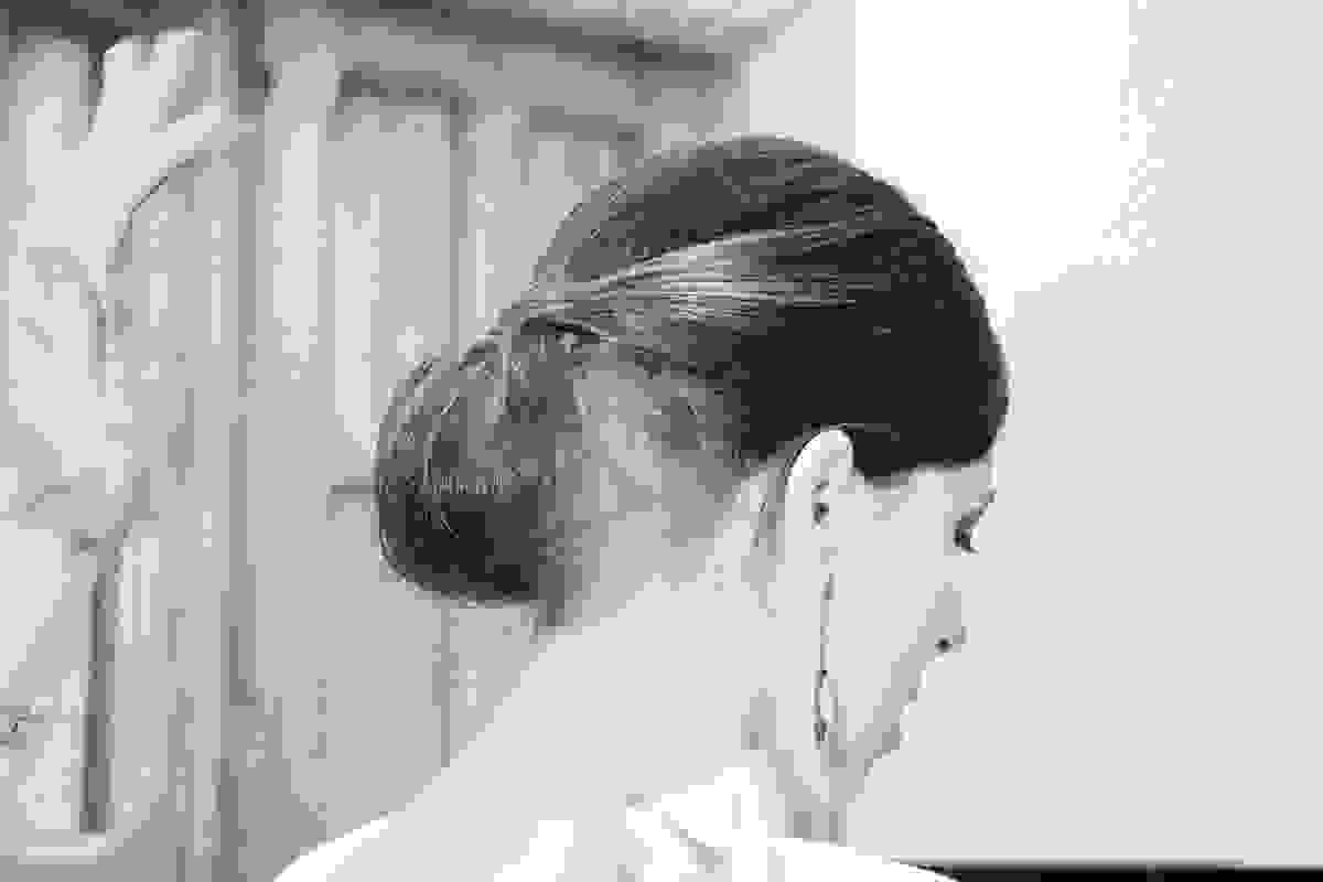 Best updo hairstyles showcased in stylish messy bun look.