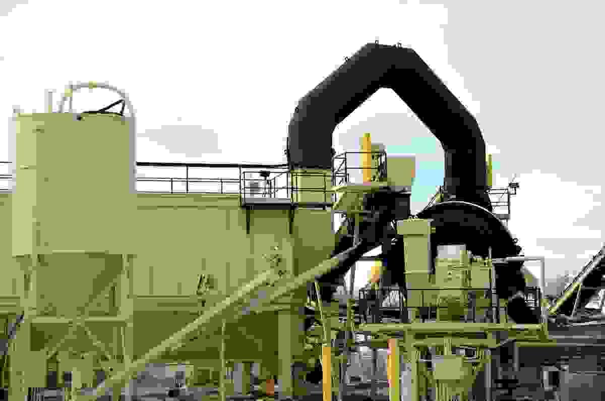 outdoor dust collection system efficiently capturing wood debris