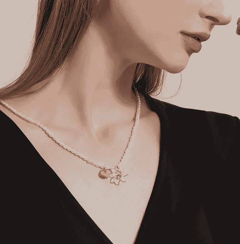 Stunning orange fruit necklace showcasing vibrant design.