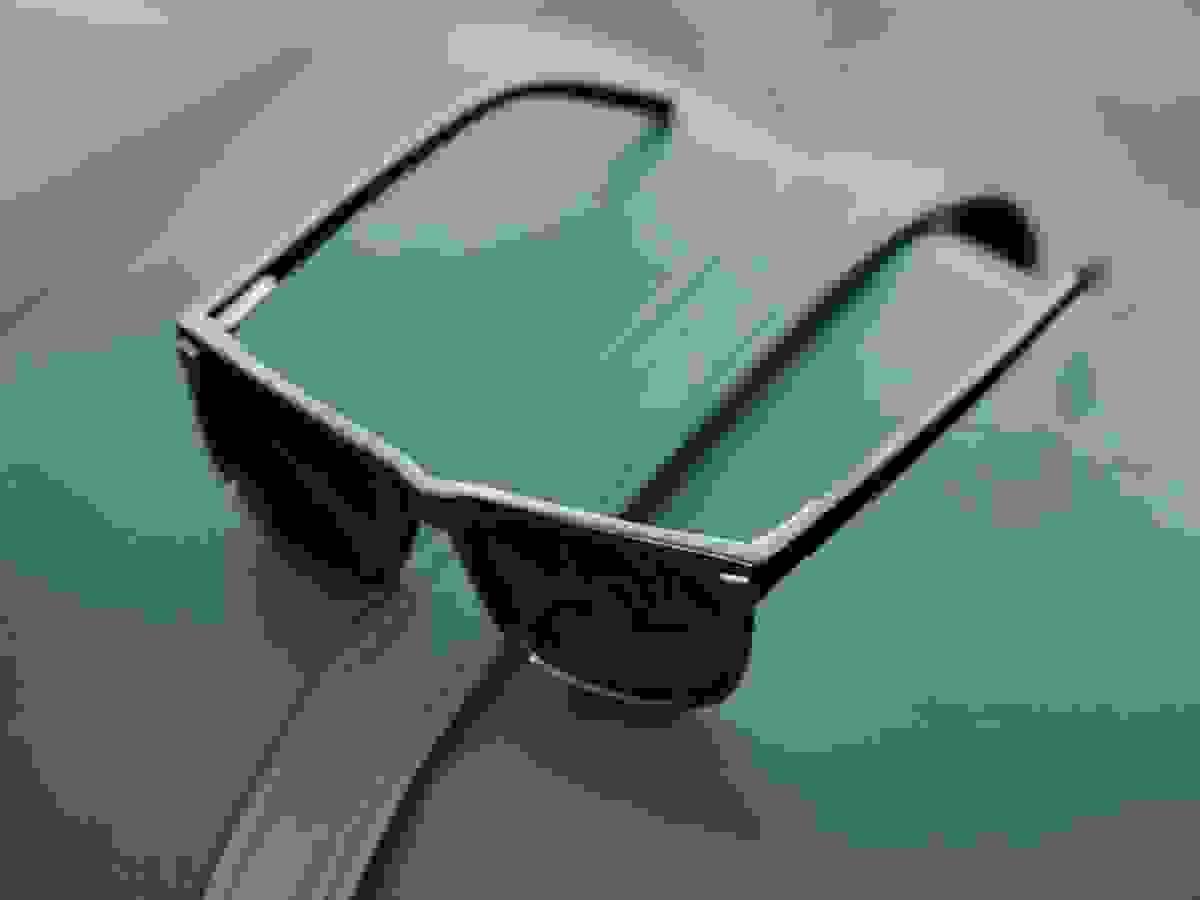 Trendy display featuring black wayfarer sunglasses attracting customers.