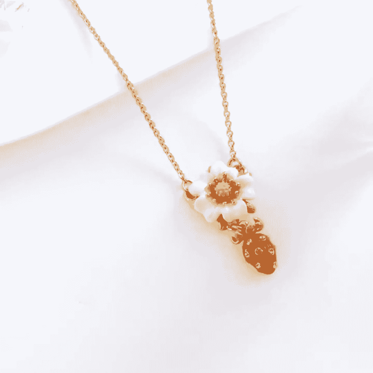 Delightful fruit jewelry showcasing various styles including strawberry necklace.