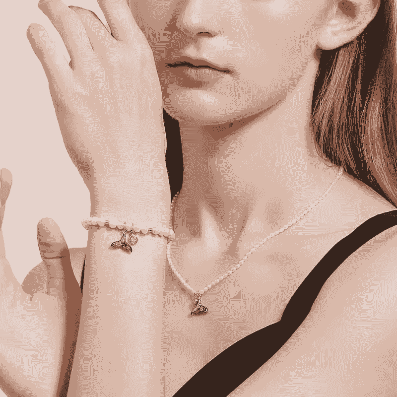 Various styles of elegant pearl bracelets including gold and pearl combinations.