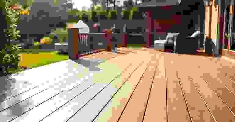 composite wood decking installation process with workers