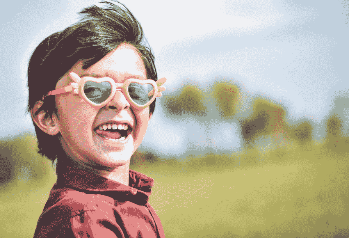 Kids wearing bulk black sunglasses enjoying outdoor activities.