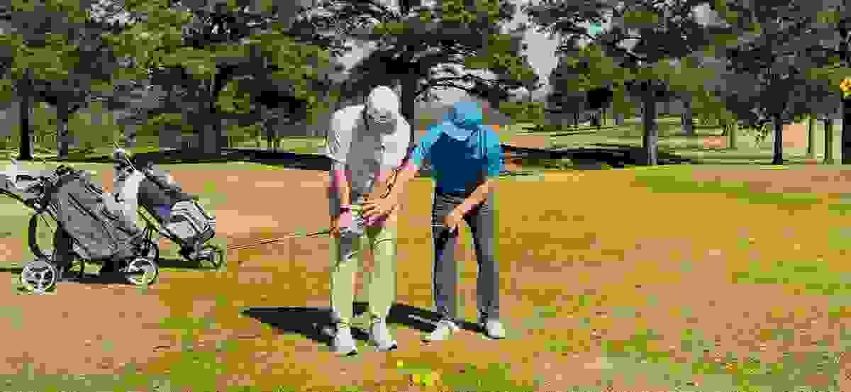 Mark Rippy teaching Rachon Johnson the "Shaft Awareness Drill" at Vantage Point Golf Center. Mark Rippy teaching Rachon Johnson the "Shaft Awareness Drill" at Vantage Point Golf Center.