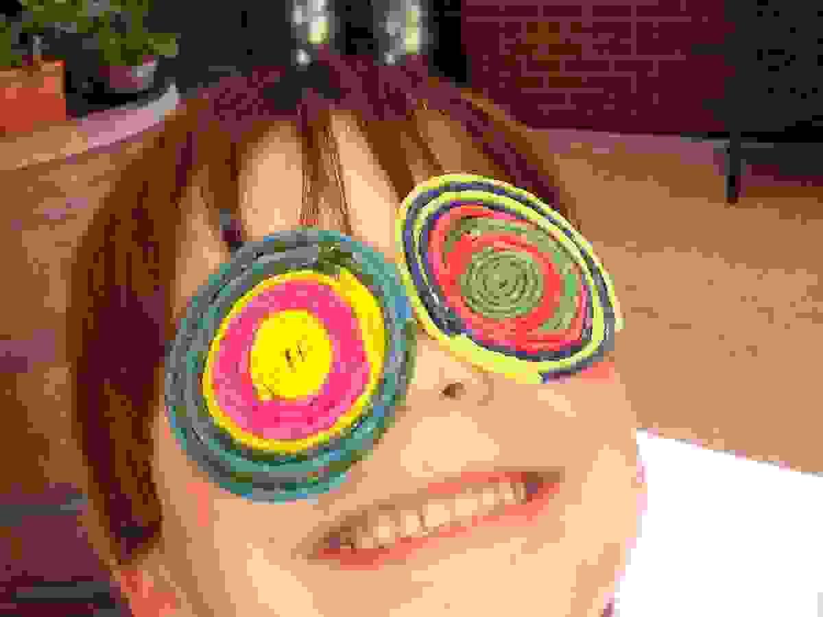 A child with funny glasses made with wax art materials. Photo is not a client. Photo credit: Laurie Ferguson. A child with funny glasses made with wax art materials. Photo is not a client. Photo credit: Laurie Ferguson.