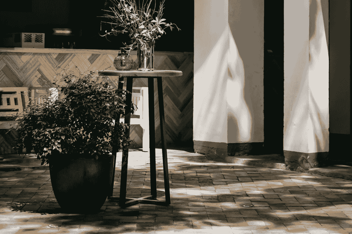 Outdoor tile patio ideas with herringbone patterned tiles