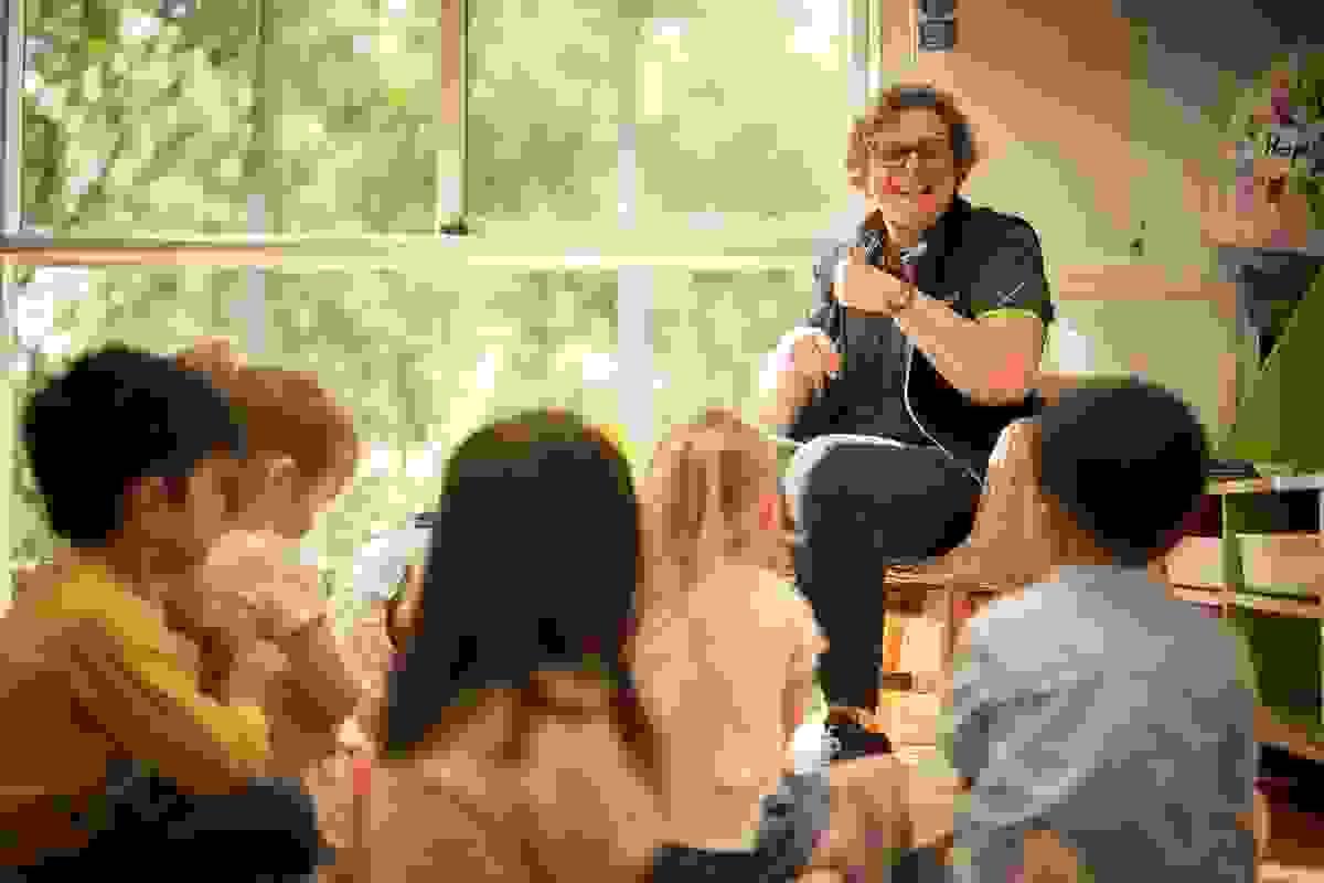 Educator leading a group time with children Educator leading a group time with children