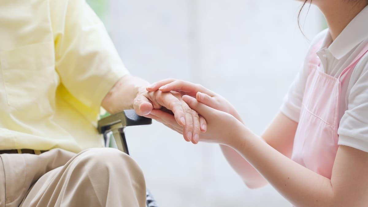 "A loving couple embracing each other in nature's beauty."