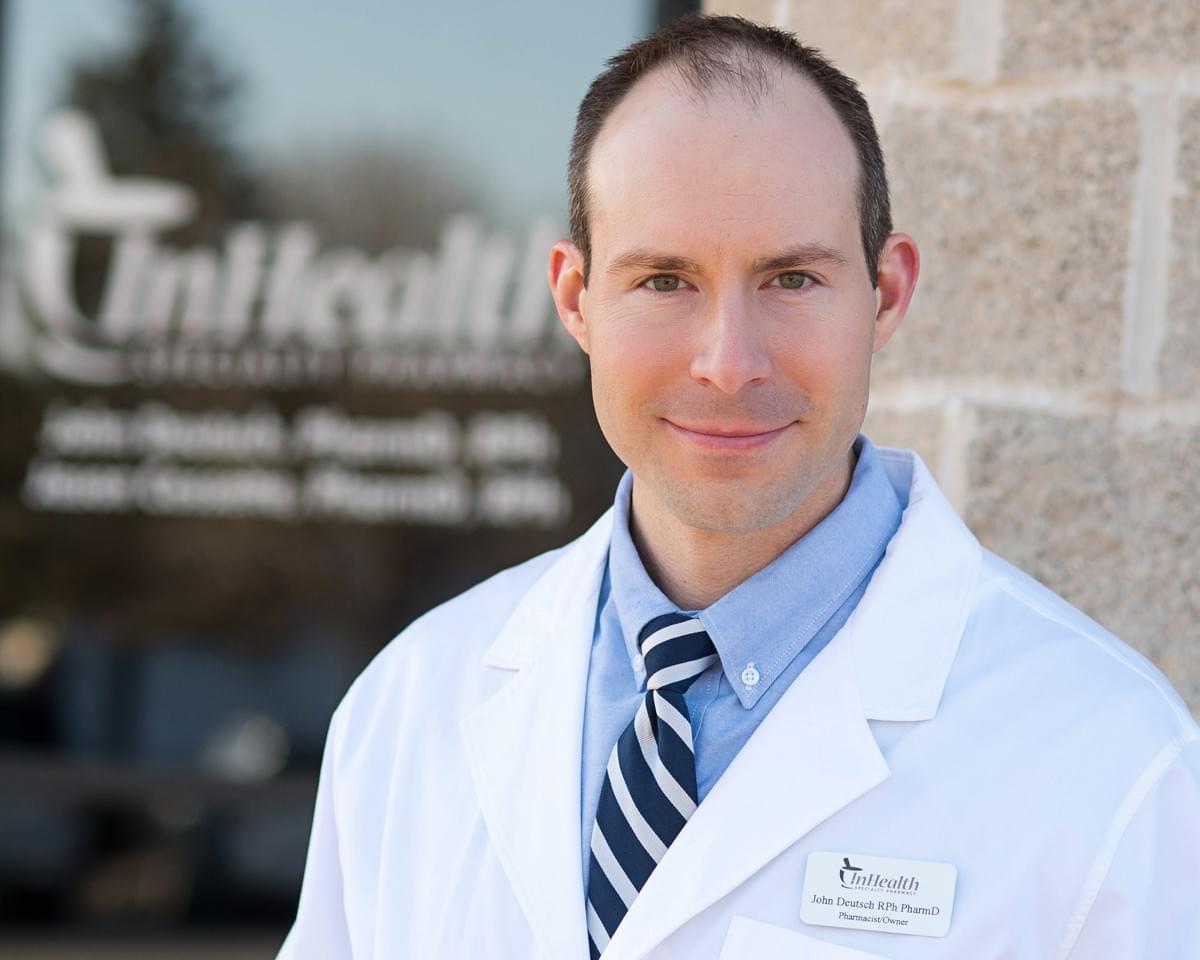 John Deutsch Pharmacist in White Labe Coat Standing outside InHealth Specialty Pharmacy in Fargo