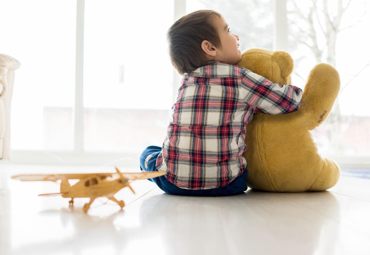 Autistic Young Boy on Compounded Medications from InHealth Specialty Pharmacy Holding Teddy Bear