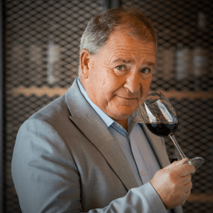 Gary Knight, wine expert holding a glass of red wine