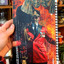 Picture of a collage with a man in a red military jacket standing infront of fire with cats all around him