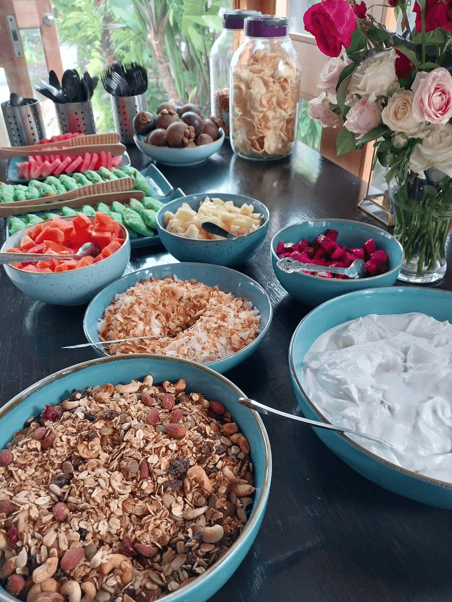DIY granola bowls and fresh fruit at the breakfast buffet at Spaces Bali