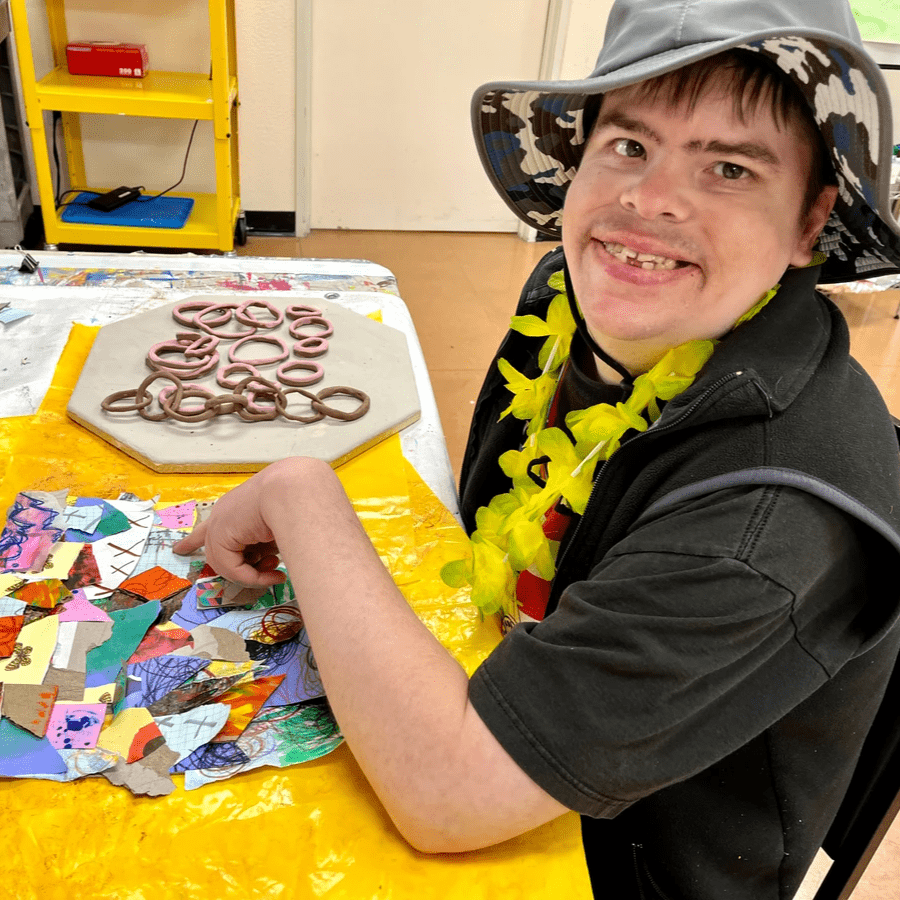 Artist Ryan Tevlin with his artwork