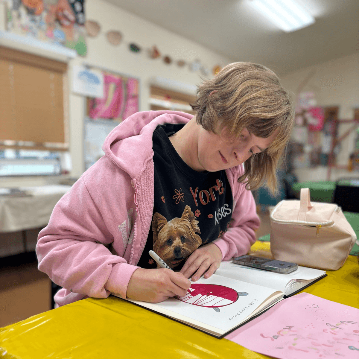 Artist Aundie McClelland working on art.