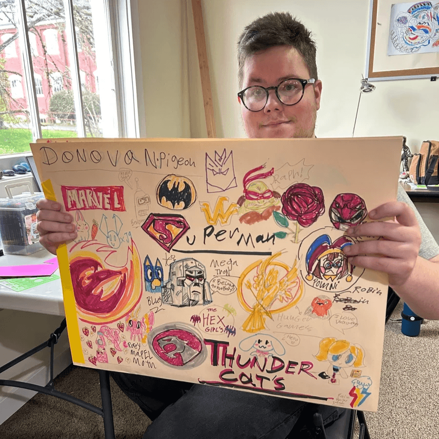 Artist Donovan Pigeon displaying art.