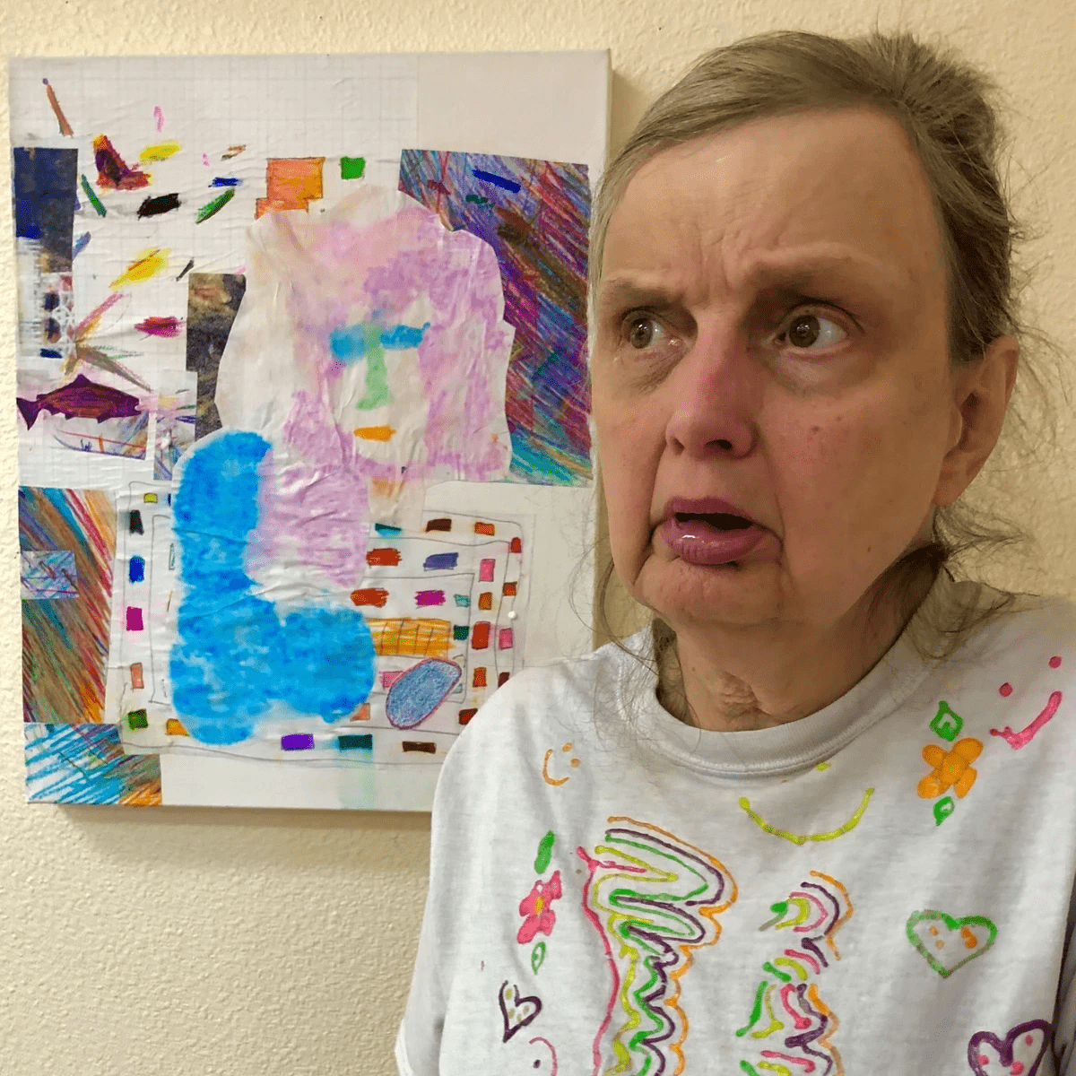 Artist Anna Trammell with her artwork