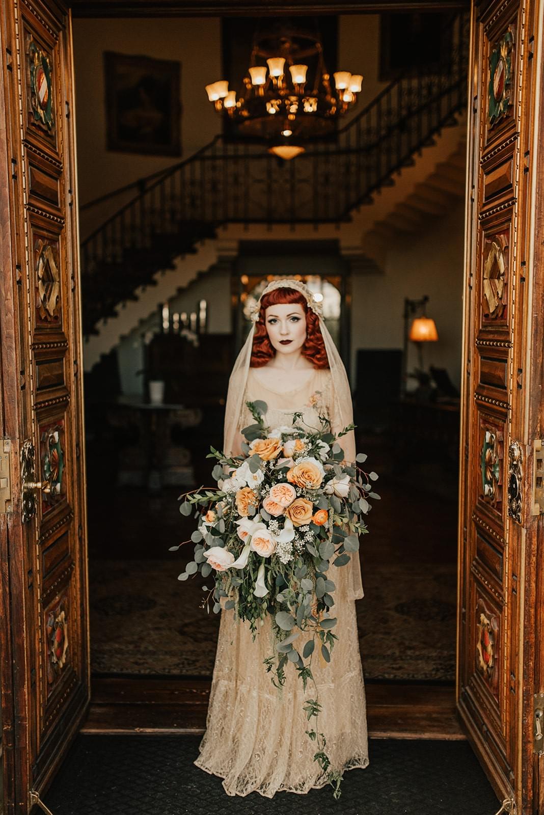 This photo was the most liked Instagram post of my career. I designed it intuitively based on the venue. I had no idea the bride would be period perfect and her bouquet looked like an Oscar worthy piece of set dressing. 