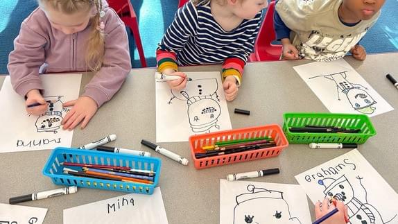Children drawing creative art projects at Ballston Children’s Center daycare in Arlington, VA Children drawing creative art projects at Ballston Children’s Center daycare in Arlington, VA
