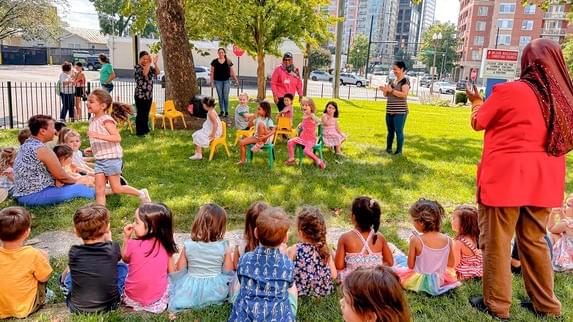 Preschoolers playing games on the grass during Ballston Children’s Center summer camp in Arlington County. Preschoolers playing games on the grass during Ballston Children’s Center summer camp in Arlington County.