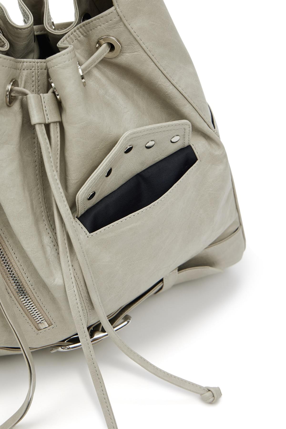 Deinet- stud belted bucked bag