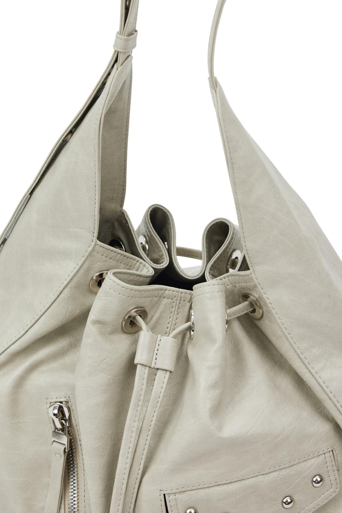 Deinet- stud belted bucked bag
