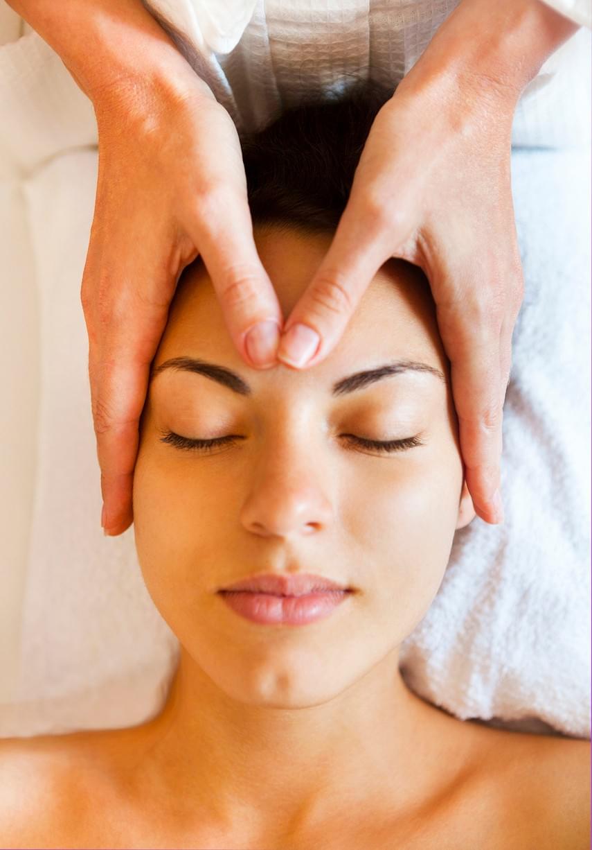 cozy self care with journal, tea, flowers and candle