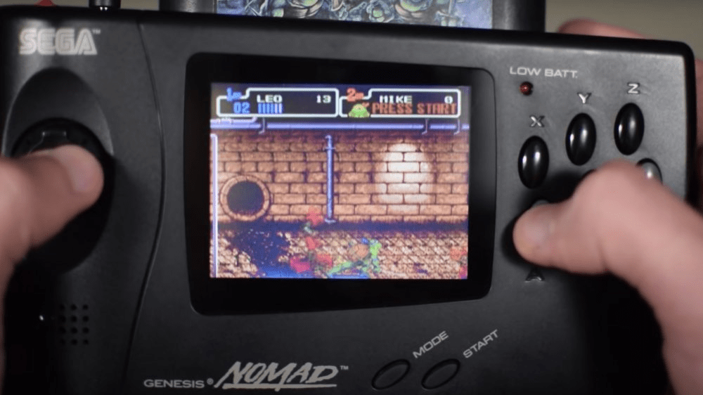 Handheld game onsole that plays genis games
