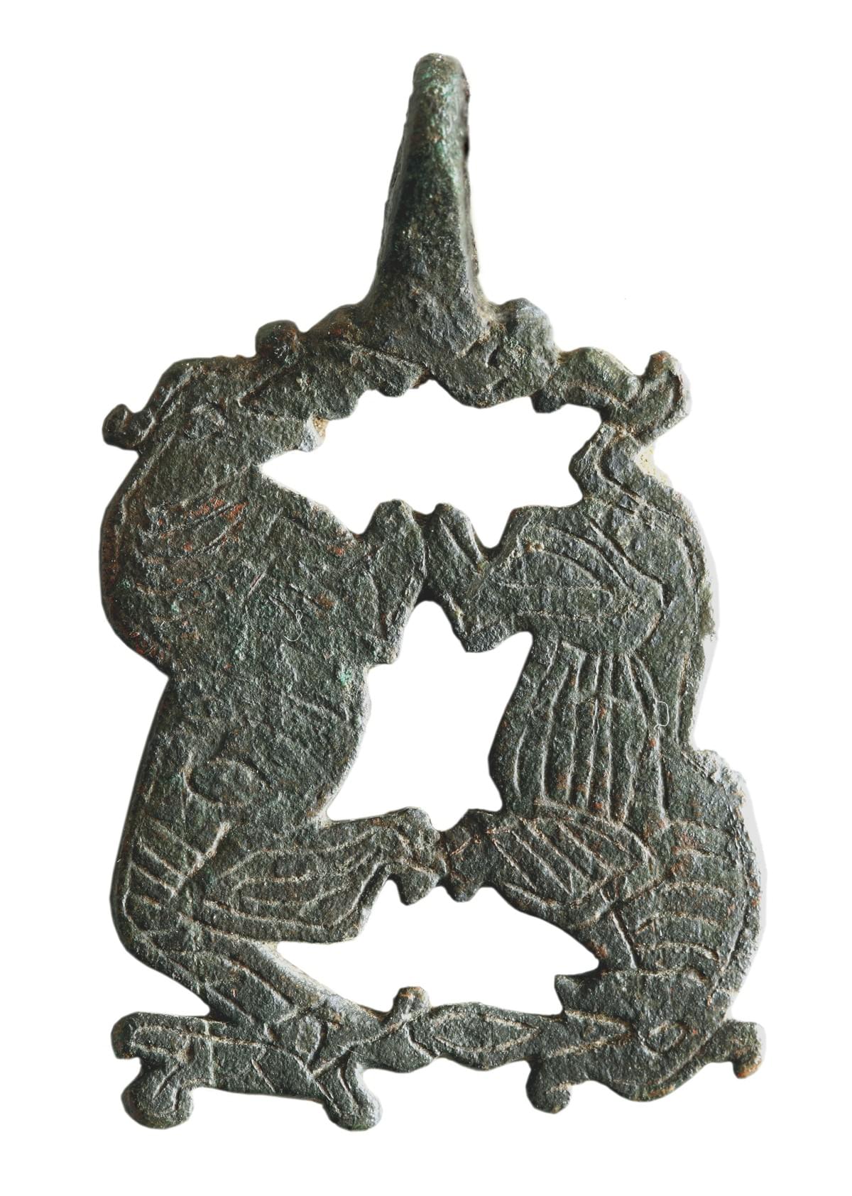 11th century bronze harness pendant from Thetford, Norfolk, purportedly showing two wolves (Sköll and Hati?).