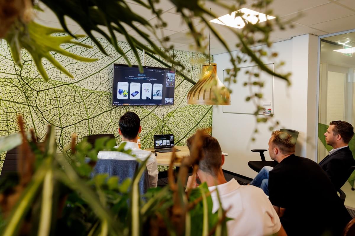 Experts from the KNVB (Royal Dutch Football Association) reviewing Gengee’s gamified youth football solutions during the UEFA Reimagine Football collaboration event, featuring the INSAIT JOY smart football technology.