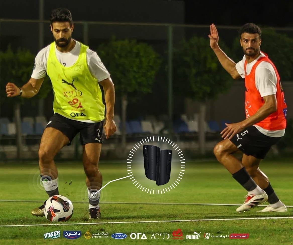 Two Egypt National Team players training for the 2026 Africa Cup of Nations, with the INSAIT JOY smart shin guard highlighted on one of the athletes.