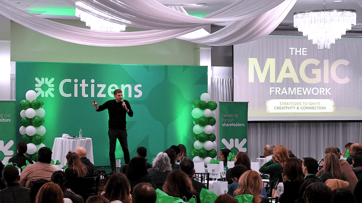 john duke logan presenting his keynote on innovation